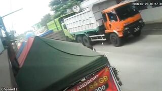 Motorcyclist Seriously Injured After Getting Sandwitched By Two Trucks