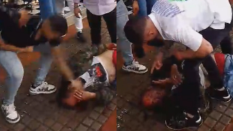 Homeless Man Gets Beaten For Collecting Garbage In Front Of Business In Colombia