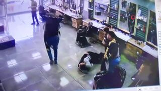 Chaos in Turkish Barbershop: Armed Masked Man Shoots Wildly at Everyone Present