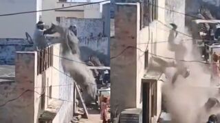 Man Throwing Sand During Celebration Falls From The Roof