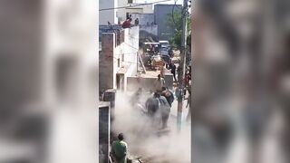 Man Throwing Sand During Celebration Falls From The Roof