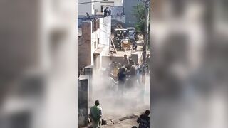 Man Throwing Sand During Celebration Falls From The Roof