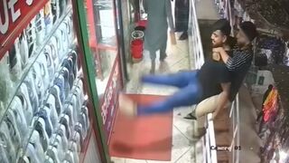 Two Men Plummet from 2nd Floor During Playful Moment in Crowded Bangladesh Market