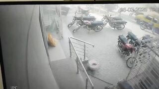 Bloody Chaos at Bank: Two Gunmen Unload 5 Bullets into Responding Cop