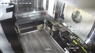Masked Gunmen Unleash Chaos: Intense Shootout and Armed Robbery at Jewelry Store
