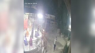 Masked Attacker Throws Explosive Device into Temple During Prayer, Injuring Devotees