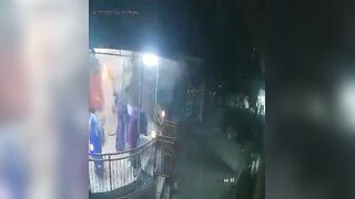 Masked Attacker Throws Explosive Device into Temple During Prayer, Injuring Devotees