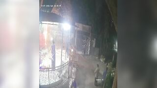 Masked Attacker Throws Explosive Device into Temple During Prayer, Injuring Devotees