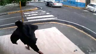 Karma on Wheels: Robbers Who Stole Woman's Cellphone Get Hit by Hero Driver