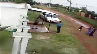Drives Car Into Wife, Gets Out and Tries to Strangle Her in Broad Daylight