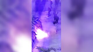 Woman Sets Riot Police Ablaze During Women's Day March in Mexico