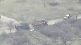 A HIMARS multiple launch rocket system covers a concentration of RU infantry
