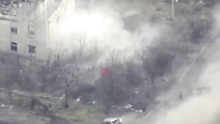 A HIMARS multiple launch rocket system covers a concentration of RU infantry