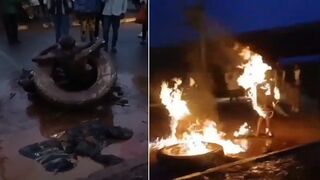 Thief Set Ablaze by Mob, Still Moving Until They Crush His Head with Boulder