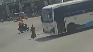 Woman Knocked, Killed By Bus On The Busy Road In India