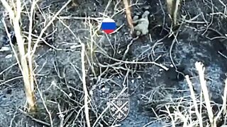 A UA soldier with drone support in close combat with a pair of Orcs