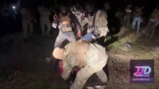 Horrific Video Shows CJNG Cartel Members Hacking Two Rivals Alive with Axes & Machete