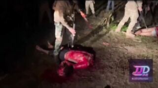 Horrific Video Shows CJNG Cartel Members Hacking Two Rivals Alive with Axes & Machete
