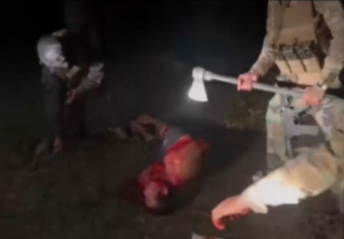 Horrific Video Shows CJNG Cartel Members Hacking Two Rivals Alive with Axes & Machete