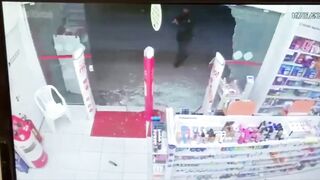 Armed Robber Barricades Himself in Pharmacy, Killed in Intense Police Shootout