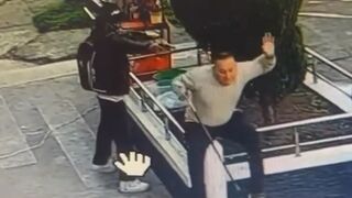 Hooded Assassin Executes Unsuspecting Victim in Cold-Blooded Back Ambush