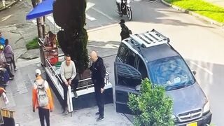 Hooded Assassin Executes Unsuspecting Victim in Cold-Blooded Back Ambush