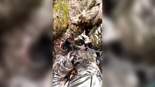 Providing first aid and evacuating a wounded soldier