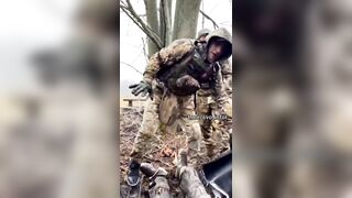 Providing first aid and evacuating a wounded soldier