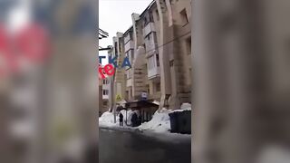 Block of ice crushed a woman to death
