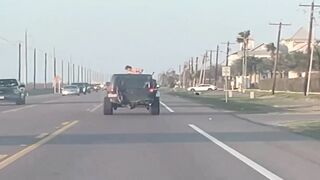 From Roof Dancing to Road Ejection: Jeep Passenger Hurled in Brutal Tesla Impact