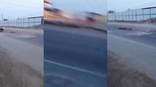 Man is run over by a truck and his remains are left on the road