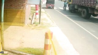 Motorcyclist Run Over And Trapped By The Truck Wheel