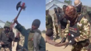 Nigerian Soldiers Having Fun With Killed Boko Haram Terrorist