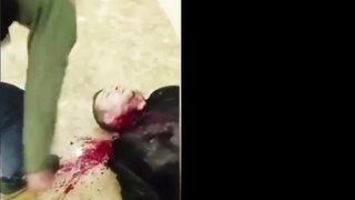 A Russian has his throat slit