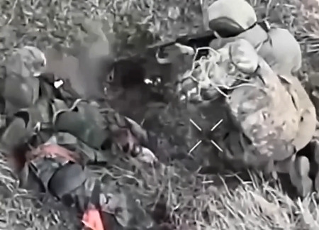 An Orc arrives to rescue his seriously injured colleague and commits suicide himself
