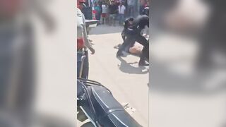 Hitman Brutally Beaten by Angry Mob After Failed Assassination Attempt on Worker