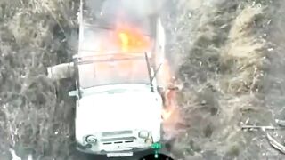 A russian invader got stuck in a burning vehicle