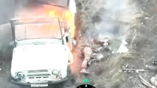 A russian invader got stuck in a burning vehicle