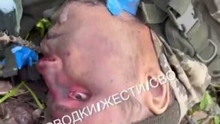 Kicking and mocking dead ukrats.