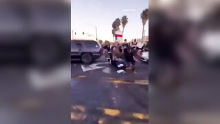 SUV Driver Goes Human Bowling At Cali Takeover