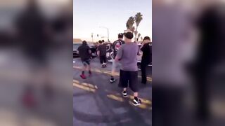 SUV Driver Goes Human Bowling At Cali Takeover