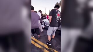 SUV Driver Goes Human Bowling At Cali Takeover