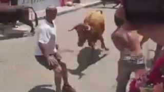 Bull Takes Out A Man During Festival