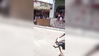 Bull Takes Out A Man During Festival