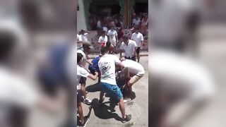 Bull Takes Out A Man During Festival