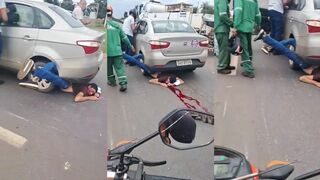 man got tangled up in a car