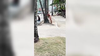 Naked Woman in Brazil throws Stones at Man on the Bench
