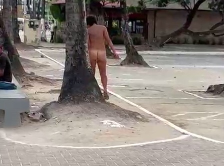 Naked Woman in Brazil throws Stones at Man on the Bench