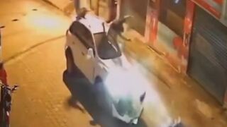 Motorcyclists flying over carsfollowing high-speed collision