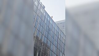 Woman Jumps From A Tall Building